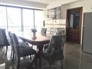 Modern dining room with large dining table and chairs