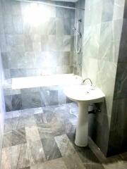 Modern bathroom with marble tiles