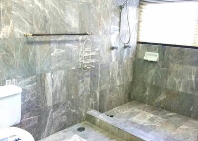 Modern bathroom with gray marble tiles