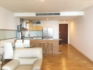 Open concept living area with kitchen and dining space