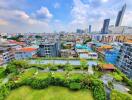 Aerial view of urban landscape with green rooftop garden