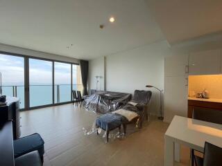 Modern living room with ocean view and natural lighting