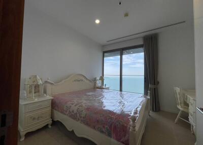 spacious bedroom with sea view