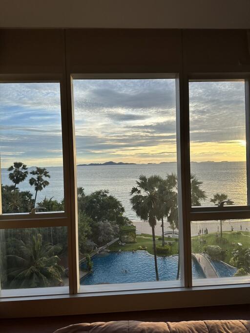 Living room with large windows and ocean view