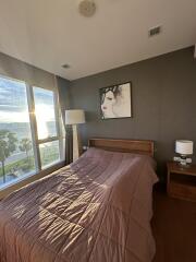 Bedroom with a large window view