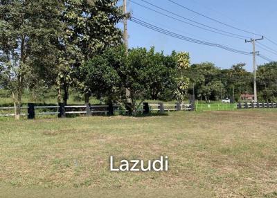 Sell/Rent 7 rai land close to the main road.