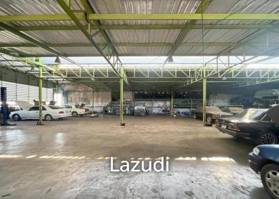 Prime Corner Showroom for Car Dealership or Business with Heavy-Duty Lift and Ample Parking