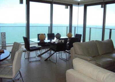 Modern living room with sea view and dining area
