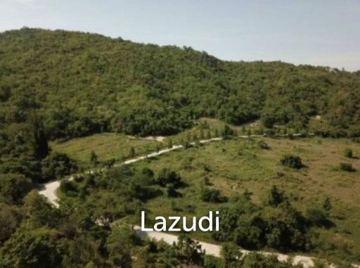 Beautiful elevated land of 15 Rai with great views near Banyan Golf Club.