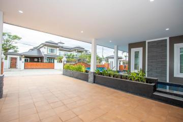 3 Bed single-storey house with L-shaped swimming pool at Grand Tropicana by Sansaran