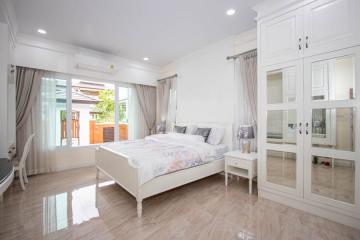 3 Bed single-storey house with L-shaped swimming pool at Grand Tropicana by Sansaran