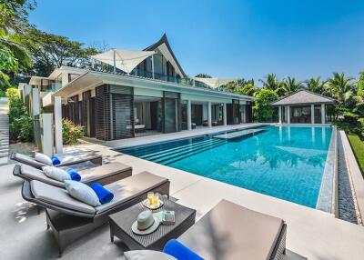 This exotic 5-bedroom villa boasts a beachfront