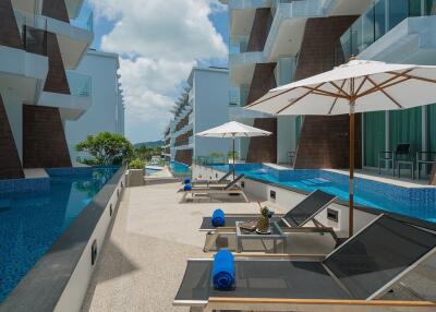 Luxury studio apartments, with pool view and near the sea in The Beachfront project, on Rawai beach