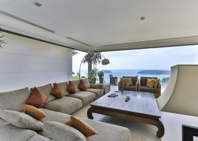 Spacious living room with ocean view and modern furnishings